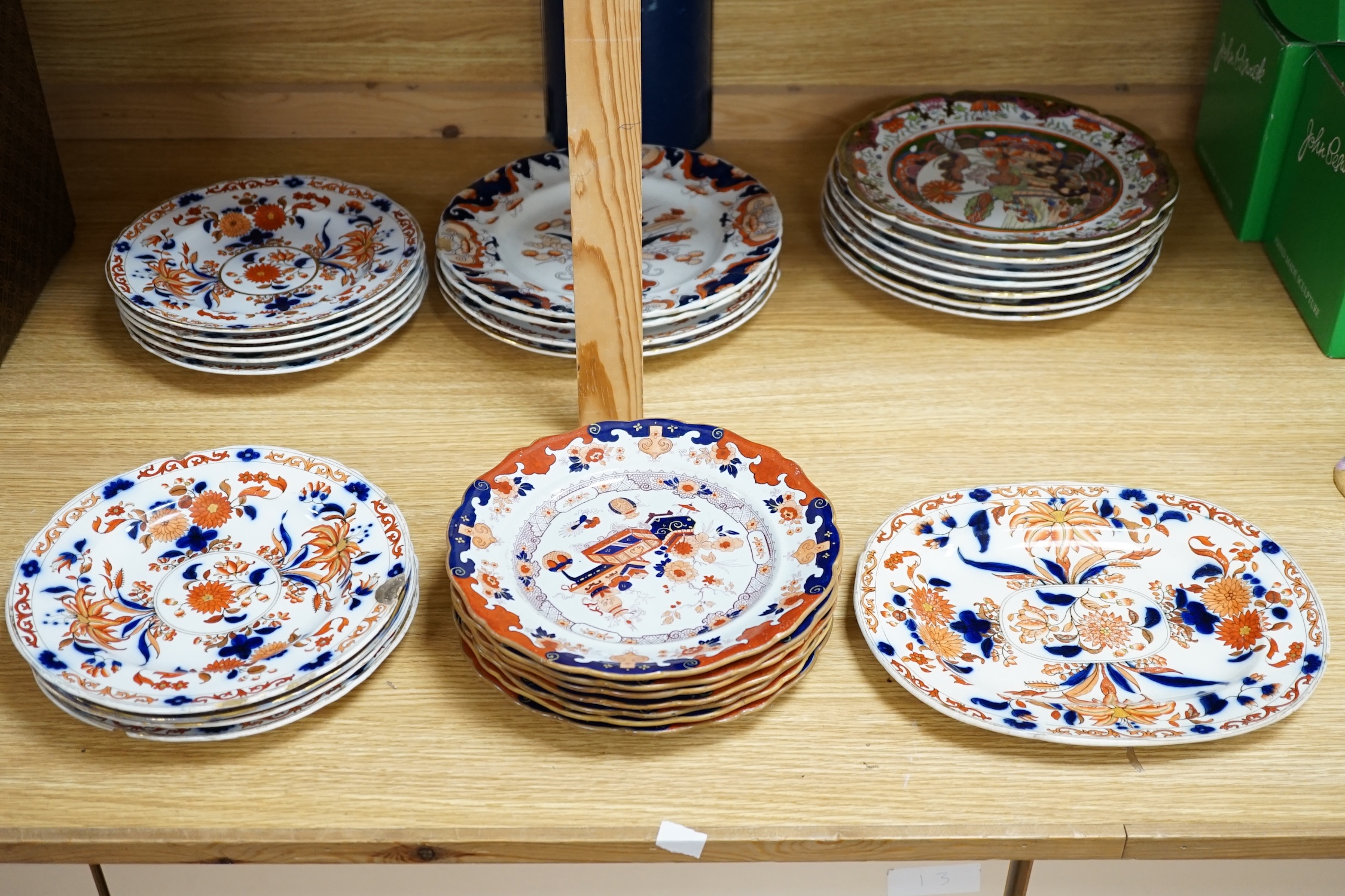Thirty ironstone Imari pattern plates and a bone china cup and saucer. Condition - fair